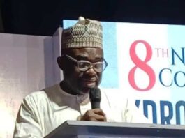 Representative of the Honourable Minister of State Petroleum Resources (Gas) and the Director of Upstream Department in the Ministry, Engr. Kamoru Busari FNSE delivering the keynote address at the 8th edition of the National Council on Hydrocarbons in Asaba, Delta State.