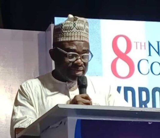 Representative of the Honourable Minister of State Petroleum Resources (Gas) and the Director of Upstream Department in the Ministry, Engr. Kamoru Busari FNSE delivering the keynote address at the 8th edition of the National Council on Hydrocarbons in Asaba, Delta State.