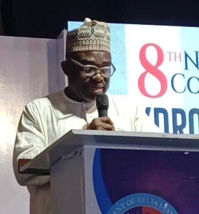 Representative of the Honourable Minister of State Petroleum Resources (Gas) and the Director of Upstream Department in the Ministry, Engr. Kamoru Busari FNSE delivering the keynote address at the 8th edition of the National Council on Hydrocarbons in Asaba, Delta State.