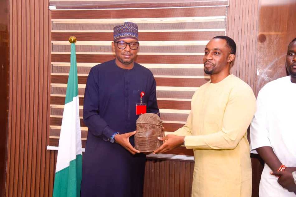 The Chairman of National Sports Commission, Mallam Shehu Dikko (middle) flanked to his left by the crown prince of Benin Kingdom, Prince Ezelekhae Ewuare,and others during a courtesy visit by the prince to the Chairman in his office on the 28th of November, 2024