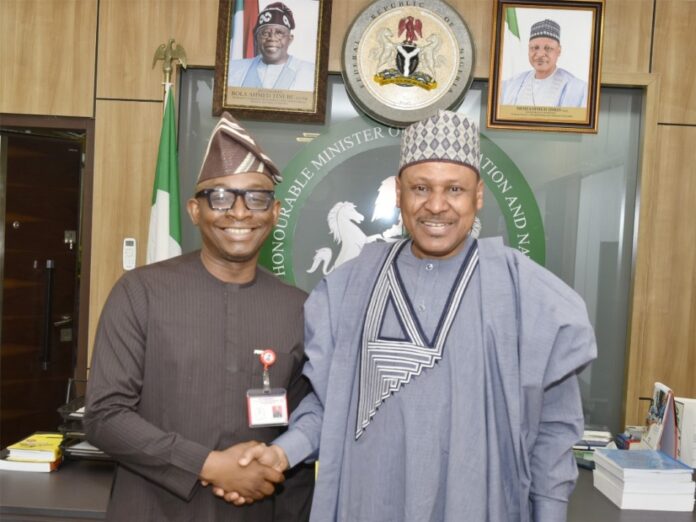 L-R: Director-General, Bureau of Public Procurement, BPP, Dr. Adebowale A. Adedokun, MCIPS in a warm handshake with the Hon. Minister, Federal Ministry of Information and National Orientation, Mr. Mohammed Idris during the DGs working visit to his office