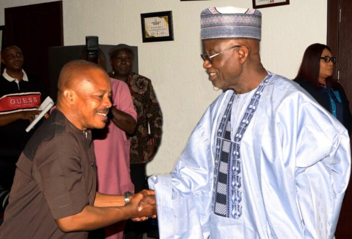 Muhammad Maigari Dingyadi Minister of Labour and Employment, Dr Muhammad Maigari Dingyadi (right) and President, Nigeria Labour Congress (NLC), Joe Ajaero (left) during the visit of the Minister to the headquarters of NLC, Abuja