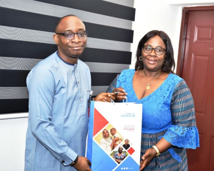 UN Women Representative1 L-R: Director-General, Bureau of Public Procurement (BPP) Dr. Adebowale A. Adedokun, MCIPS, ACFE receiving a souvenir from the leader of the delegation, United Nation Women Representative to Nigeria and Ecowas, Mrs. Beatrice Enyong during her visit to BPP in Abuja