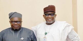 L-R : The Surveyor General of the Federation (SGOF) Abduganiyu Adeyemi Adebomehin next to him is Permanent Secretary of the Federal Ministry of Housing and Urban Development Dr Shuaib Belgore at the briefing