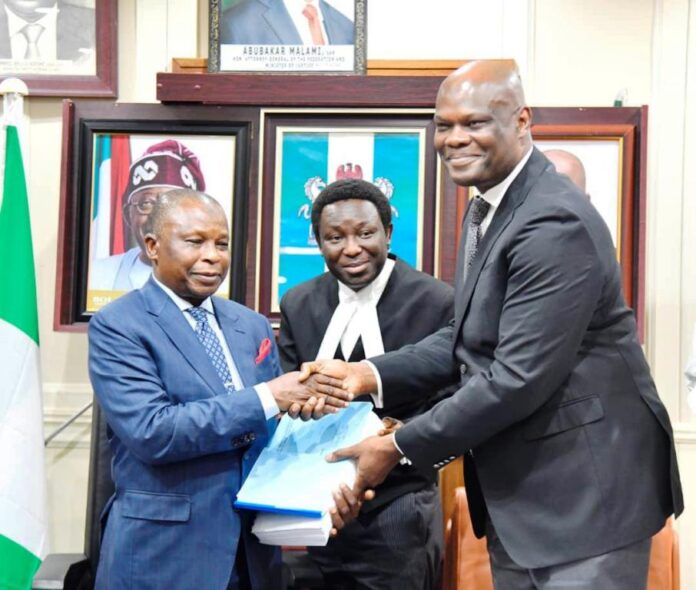 Working Group The Honourable Attorney-General of the Federation and Minister of Justice, Prince Lateef Fagbemi SAN, receiving the Report from the Facilitator of the Working Group on the Legal Status of Inmates in Correctional Centres, Olawale Fapohunda (SAN) on Wednesday 19th March, 2025 in Abuja.