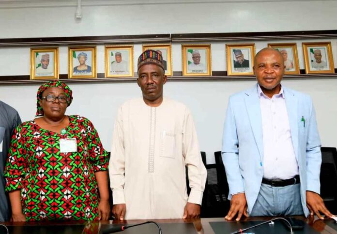 Inauguration of FMITI arm of the Ministerial Committee on Service Innovation The Perm. Sec. FMITI, represented by Dir. Reform Co-ordination Dept FMITI, Mr Naziru Abbas Mohammed (middle) , the Director Service Innovation Dept. Office of the Head of Service, Mrs Felicia Ugoji (left) and the Deputy Director, Service Innovation Dept. Office of the Head of Service, Mr Henry Nwaedo (right) during the Inauguration of FMITI arm of the Ministerial Committee on Service Innovation.
