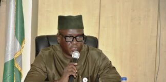 Representative of the Permanent Secretary and the Director of Midstream/DownStream Department, Mr. Mohammed Mohammed Abubakar delivering the inauguration remarks.