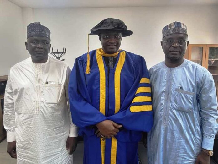 President Adama Barrow of The Gambia(middle) is flanked on his right by the Director General of the Nigerian Technical Aid Corps, Rt.Hon.(Dr.) Yusuf Buba Yakub and on his left by the Agency 's Director of Programmes, Amb. Zakari Usman, who accompanied the NTAC DG to the 17th Convocation Ceremony of the University of The Gambia held in Banjul on Saturday, April 26, 2025