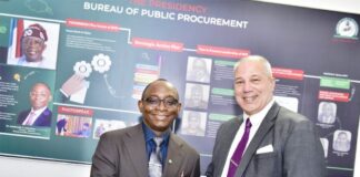 L-R: Director-General, Bureau of Public Procurement, BPP, Dr. Adebowale A. Adedokun, MCIPS, ACFE in a warm handshake with the Deputy Economic Counsellor, Embassy of the United States of America, USA, Mr. Joseph Giblin, during his visit to BPP in Abuja
