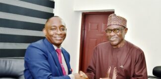L-R: Director-General, Bureau of Public Procurement, BPP, Dr. Adebowale A. Adedokun, MCIPS, ACFE presenting a souvenir to the Chairman, Council of Registered Builders of Nigeria (CORBON), Dr. Samson A. Opaluwah, during his courtesy visit to BPP