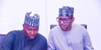 The Chairman, National Sports Commission, Mallam Shehu Dikko in a tete-a-tete with the Director, Finance and account NSC during the inauguration ceremony of King's Batton Ceremony committee in Nigeria at the media centre of MKO Abiola Stadium, Abuja.