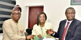 L-R: Director-General, Bureau of Public Procurement (BPP) Dr. Adebowale A. Adedokun, MCIPS, ACFE presenting a souvenir to President, Chartered Institute of Logistics and Transportation, Amb. Anthonia Ekpa while the Chairman, FCT Chapter of the Institute, Dr. Emmanuel onwudi assisted her during the courtesy visit by the CILT to the Bureau in Abuja