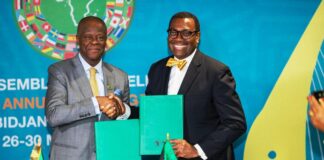 L-R: Honourable Minister of Finance and Coordinating Minister of the Economy Mr Wale Edun, OFR with the outgoing AfDB President Dr Akinwumi Adesina shortly after signing the agreement in Abidjan