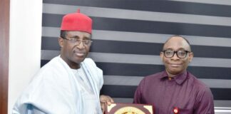 Right: Director-General, Bureau of Public Procurement (BPP) Dr. Adebowale A. Adedokun, FCIPS, ACFE, receiving a plaque from the President, Nigerian Institute of Quantity Surveyors (NIQS), Qs, Kene Nzekwe, FNIQS, during his visit to BPP office in Abuja