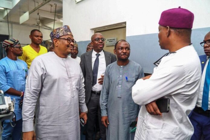 PhotoNews: Showing Unannounced Assessment Visit by the Honourable Minister of State for Health & Social Welfare, Dr. Iziaq Adekunle Salako to the Federal Medical Centre ( FMC) Abuja; asking critical questions in it's handling of emergencies. L-R: Facing the Honourable Minister were: the Chief Medical Director FMC Abuja, Prof. Sa'ad Aliyu Ahmed and, Dr. Timothy Sama'ila consultant neurosurgeon and, Head, Medical Emergency responding.