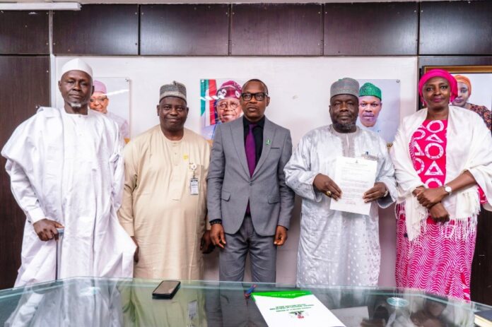 Health Records Registrar Left -Right: Hon. Ibrahim Jibrin Sokoto, former Board Chairman HRORBN: Dr. Salaudeen Jimoh mni, Director Hospital Services Department Federal Ministry of Health & Social Welfare: Hon. Minister of State for Health and Social Welfare, Dr Iziaq Adekunle Salako: Alhaji Babagana Mustapha, Registrar/CEO, HRORBN (holding his appointment letter) and, the Permanent Secretary FMOHSW, Daju Kachollom mni