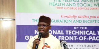 The Permanent Secretary Federal Ministry of Health & Social Welfare Daju Kachollom mni, represented by Dr. Dogara Okara Senior Technical Assistant to the Permanent Secretary, delivering the keynote address during the opening ceremony of the Inauguration & Inception of the National Technical Working Group on Front - of- Pack Labelling programme - organized by the Food & Drug Services Department of Federal Ministry of Health & Social Welfare.